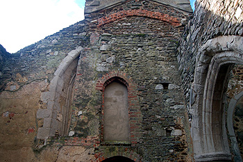 The west end of the nave showing the blocked west window January 2012